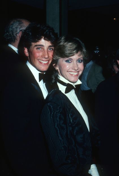 Newton-John and her first husband Matt Lattanzi wear matching tuxedos during the American Film Institute's presentation of a Lifetime Achievement award to Fred Astaire in Los Angeles in 1981. 