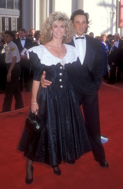 Newton-John and her then-husband Matt Lattanzi on the red carpet for the Academy Awards in in 1989.