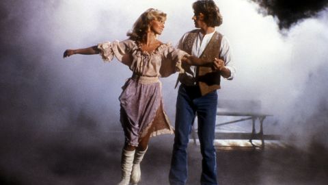 Newton-John appears with Andy Gibb in the 1980 film "Xanadu." The musical fantasy bombed at the box office, but its soundtrack sold well and spawned "Magic," a No. 1 hit.