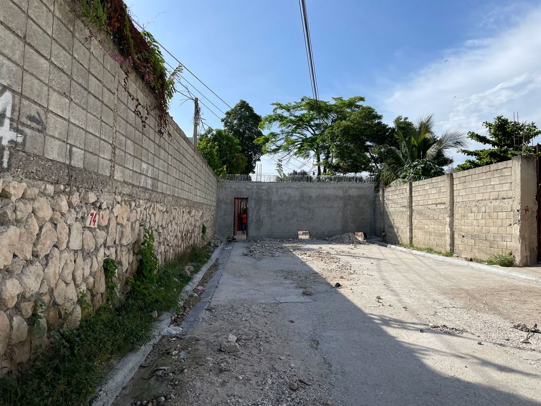 People in this neighborhood built a wall on a public road last month to keep out gangs who were kidnapping residents for ransoms. 