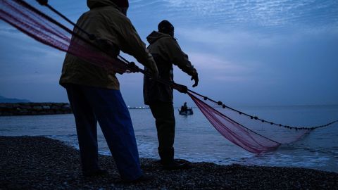 Fishermen pull in their catch in southeastern France.