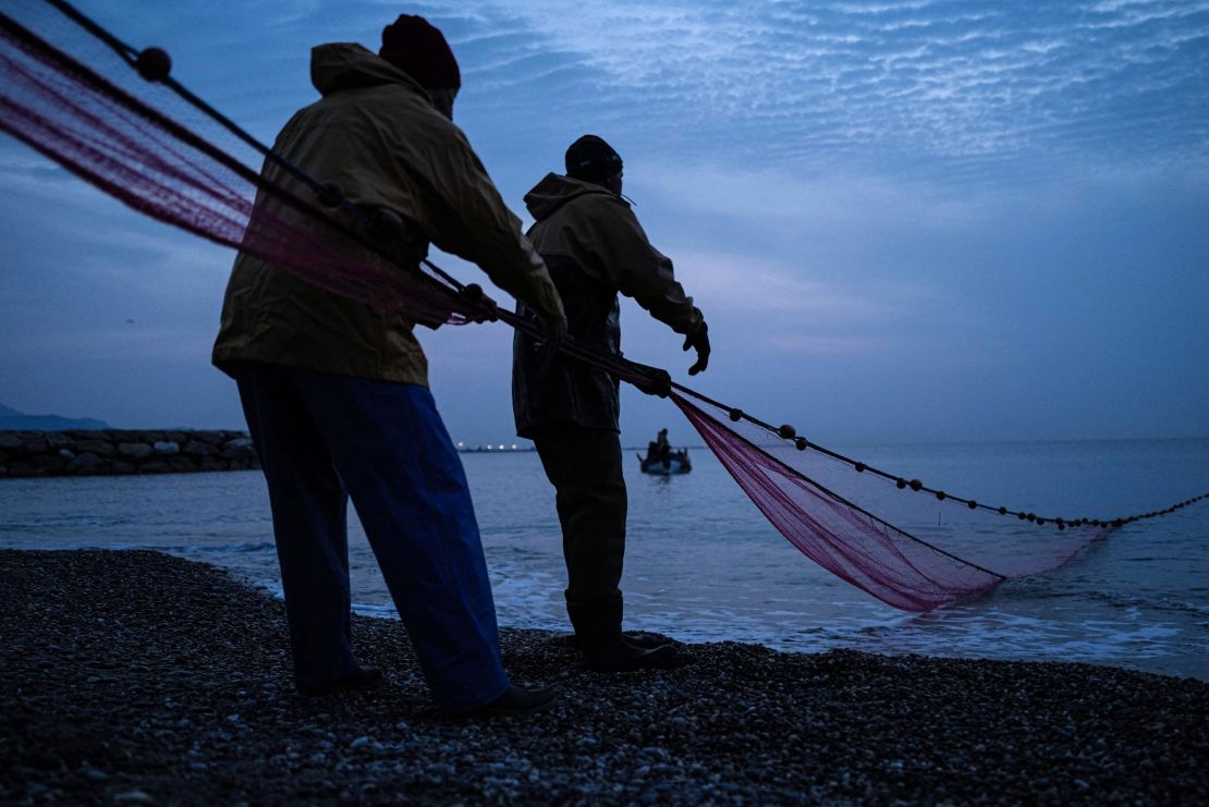 Fishermen pull in their catch in southeastern France.