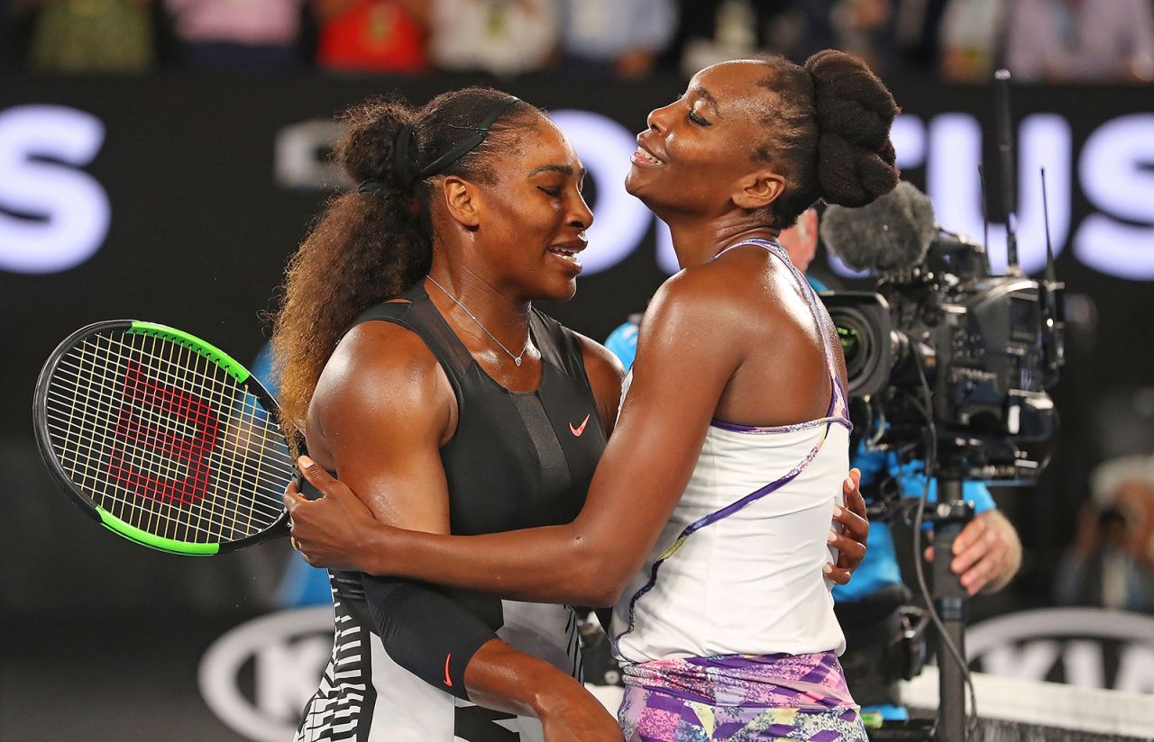 Williams is congratulated by her sister Venus after she defeated her at the Australian Open to win her 23rd grand slam singles title in 2017.