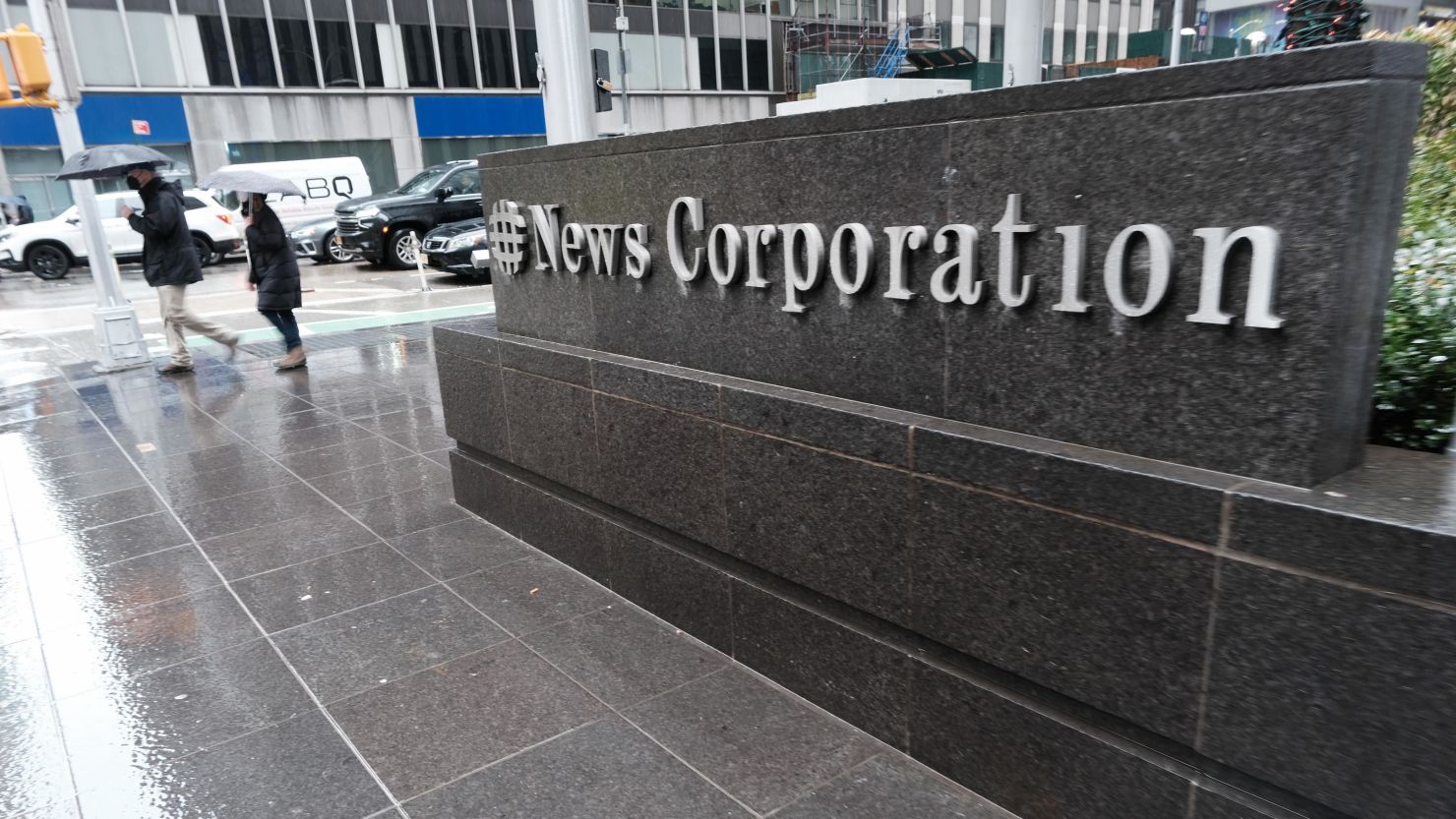 People walk past 1211 Avenue of the Americas the headquarters for News Corp on February 04, 2022 in New York City.