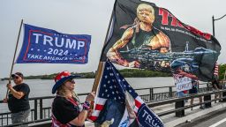 Supporters of former US President Donald Trump gather near his residence at Mar-A-Lago in Palm Beach, Florida, on August 9, 2022. - Former US President Donald Trump said on August 8, 2022, that his Mar-A-Lago residence in Florida was being "raided" by FBI agents in what he called an act of "prosecutorial misconduct." (Photo by Giorgio VIERA / AFP) (Photo by GIORGIO VIERA/AFP via Getty Images)