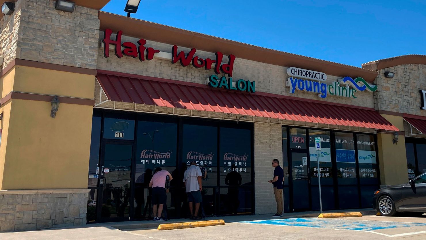 The shooting happened at Hair World Salon in Dallas, which is in a shopping center with many businesses owned by Korean Americans.