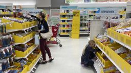 A parent shops for school supplies deals at a Target store, Wednesday, July 27, 2022, in North Miami, Fla. 