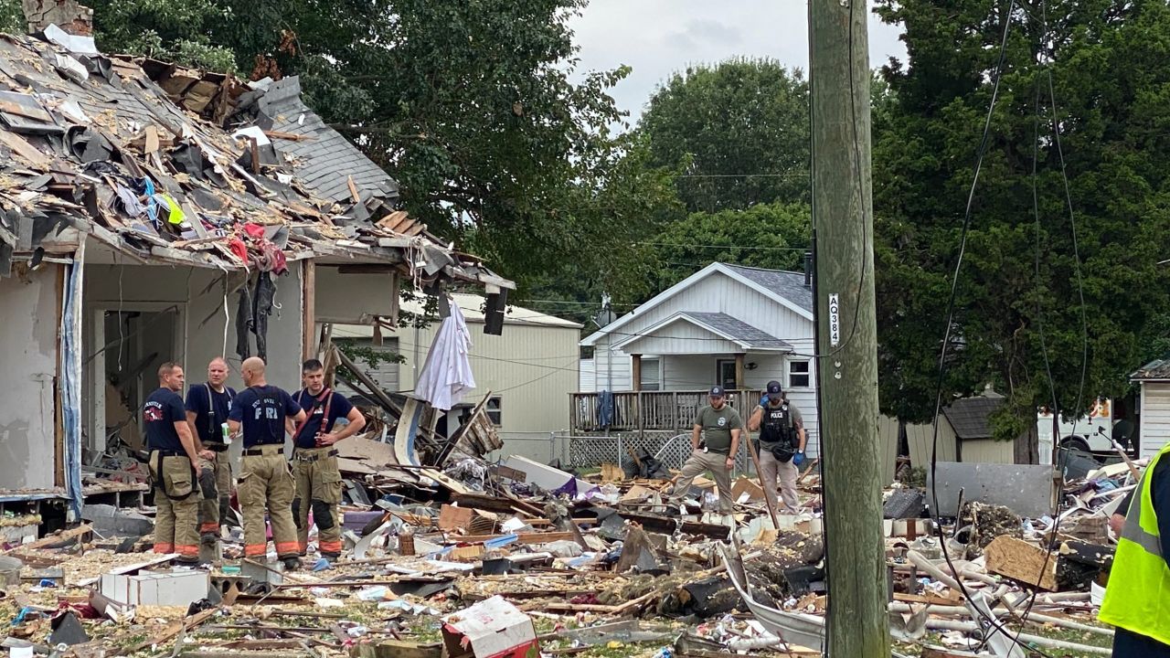 Homes sit in ruins after an explosion in Evansville, Indiana.