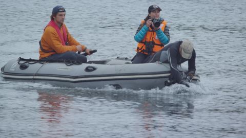 (From left) Enrique Haag Rodriguez, Carla Christie and Mauricio Handler film Chilean dolphins in Chile's Gulf of Corcovado.