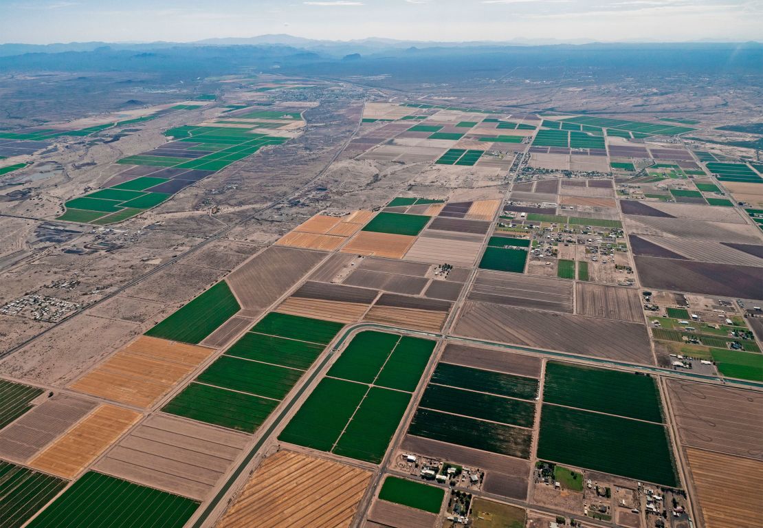 Irrigation canals course through farmlands in Pinal County, Arizona.