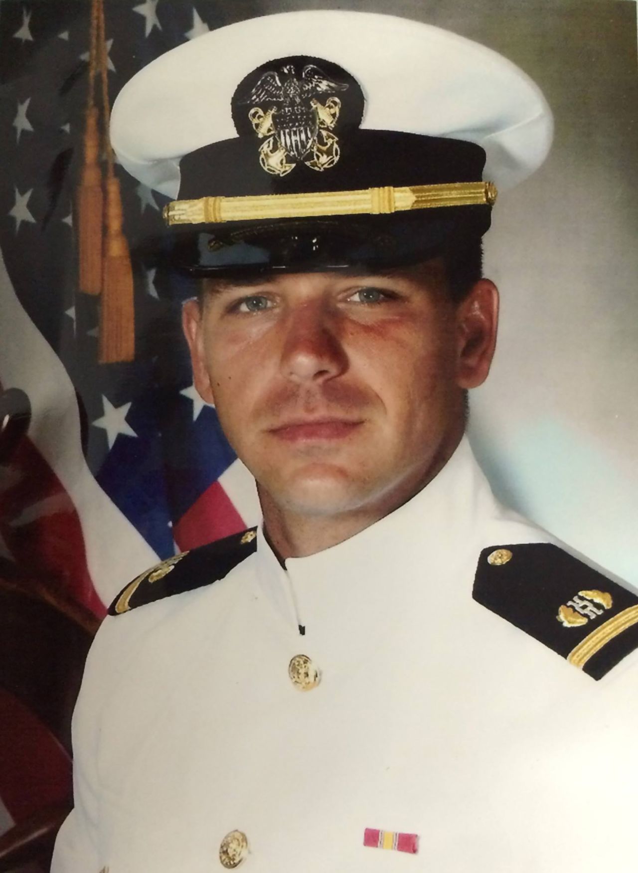 DeSantis joined the US Navy in 2004. This was his first official photo as a Navy ensign. He was assigned to the Navy Judge Advocate General's Corps.