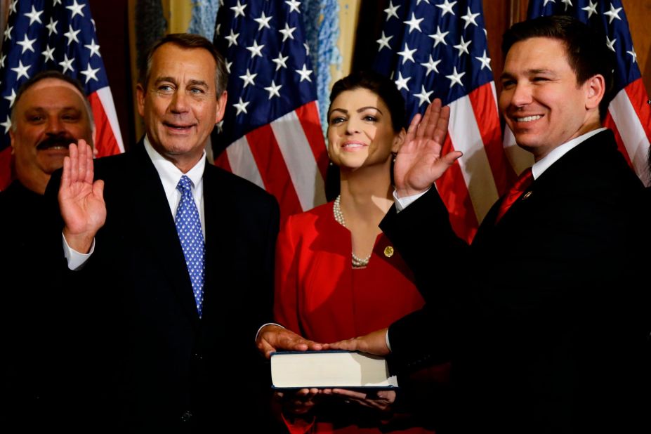 DeSantis is joined by his wife, Casey, as House Speaker John Boehner swears him into Congress in January 2013. DeSantis represented Florida's 6th District until 2018.