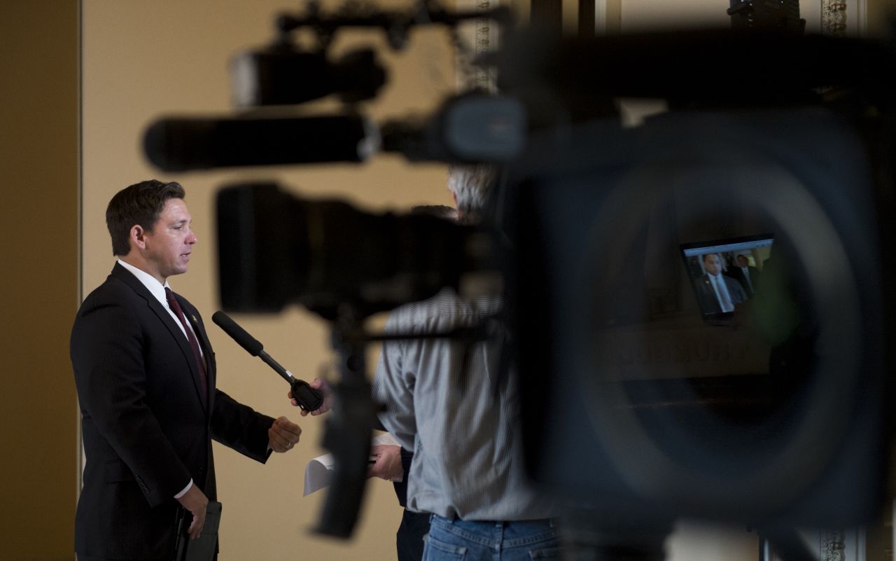 DeSantis is interviewed by a TV news crew outside of the House chamber as Congress prepared to vote on defunding President Obama's executive actions on immigration in 2015.