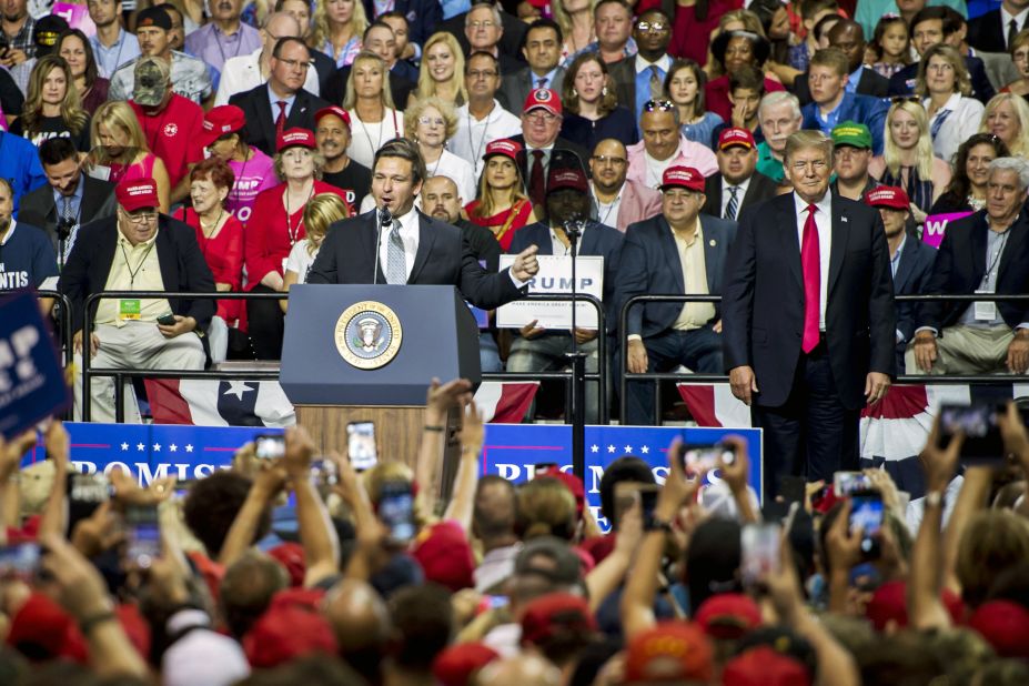 DeSantis addresses a crowd in Tampa, Florida, at a rally for President Donald Trump in July 2018.