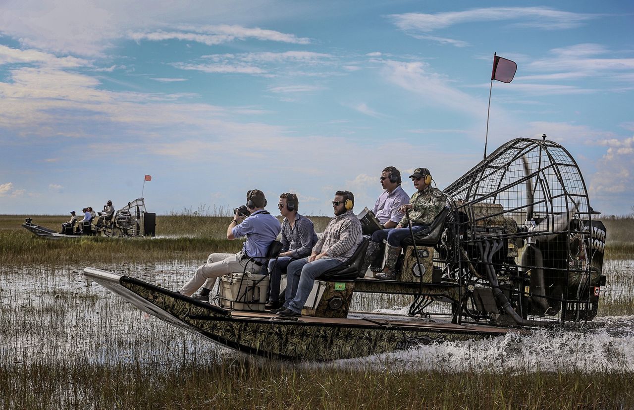 DeSantis, second from right, takes an airboat tour of the Florida Everglades in 2018. He was running for governor at the time.