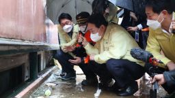 South Korean President Yoon Suk Yeol visited the flooded semi-basement in Gwanak-gu of Seoul City on Tuesday. Two sisters and a teenage daughter died in the banjiha/semi-basement when heavy rainfall flooded the house on August 8 evening