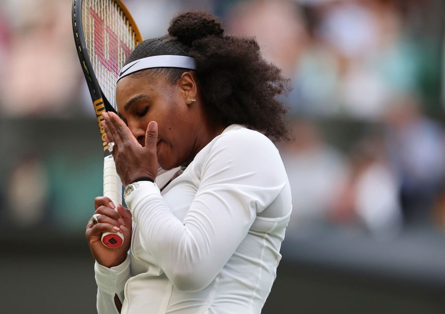 Serena reacts during her first-round Wimbledon loss to Harmony Tan in June.