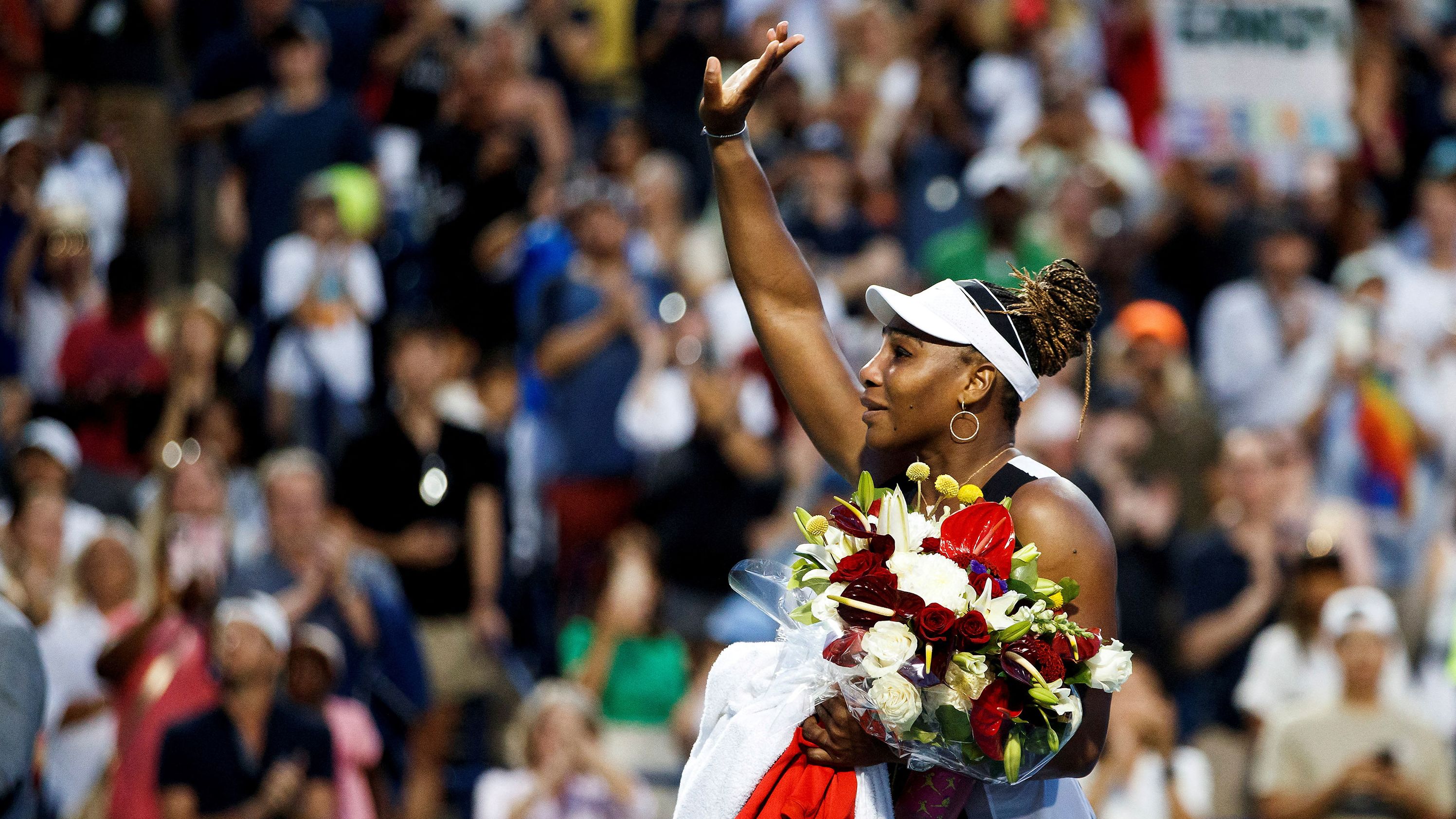 Serena waves to the crowd after <a href="index.php?page=&url=https%3A%2F%2Fwww.cnn.com%2F2022%2F08%2F11%2Ftennis%2Fserena-williams-canadian-open-spt-intl%2Findex.html" target="_blank">losing in the first round of the Canadian Open</a> on August 10. It was her first match since she announced that she would be retiring soon.