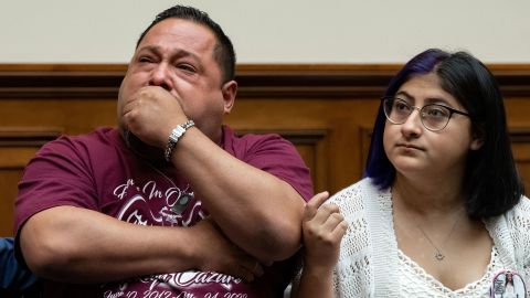 Javier Cazares, left, the father of 9-year-old Jacklyn Cazares, who was killed at Robb Elementary, sits with his daughter Jazmin Cazares during a July 27 House committee hearing in Washington.