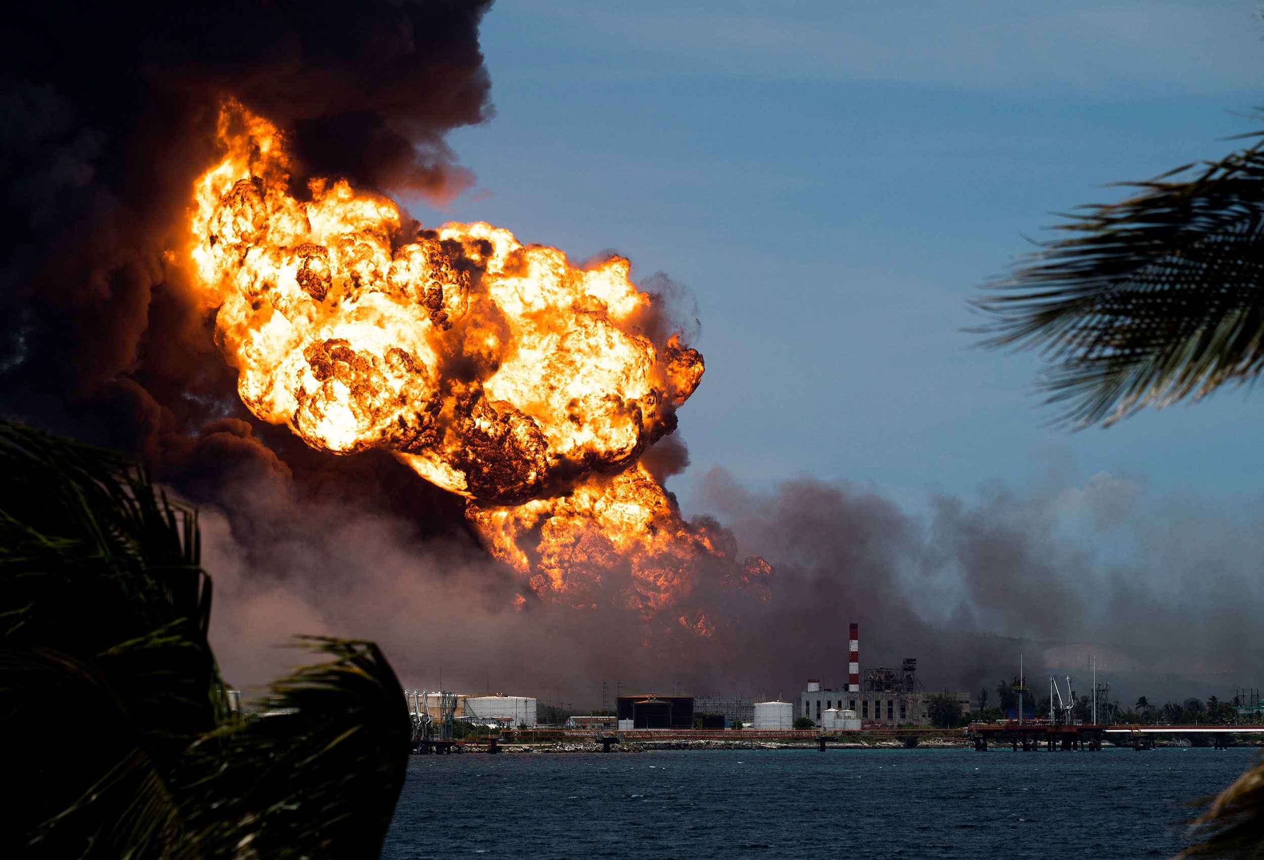 Flames rise at a fuel depot in Matanzas, Cuba, on Monday, August 8.