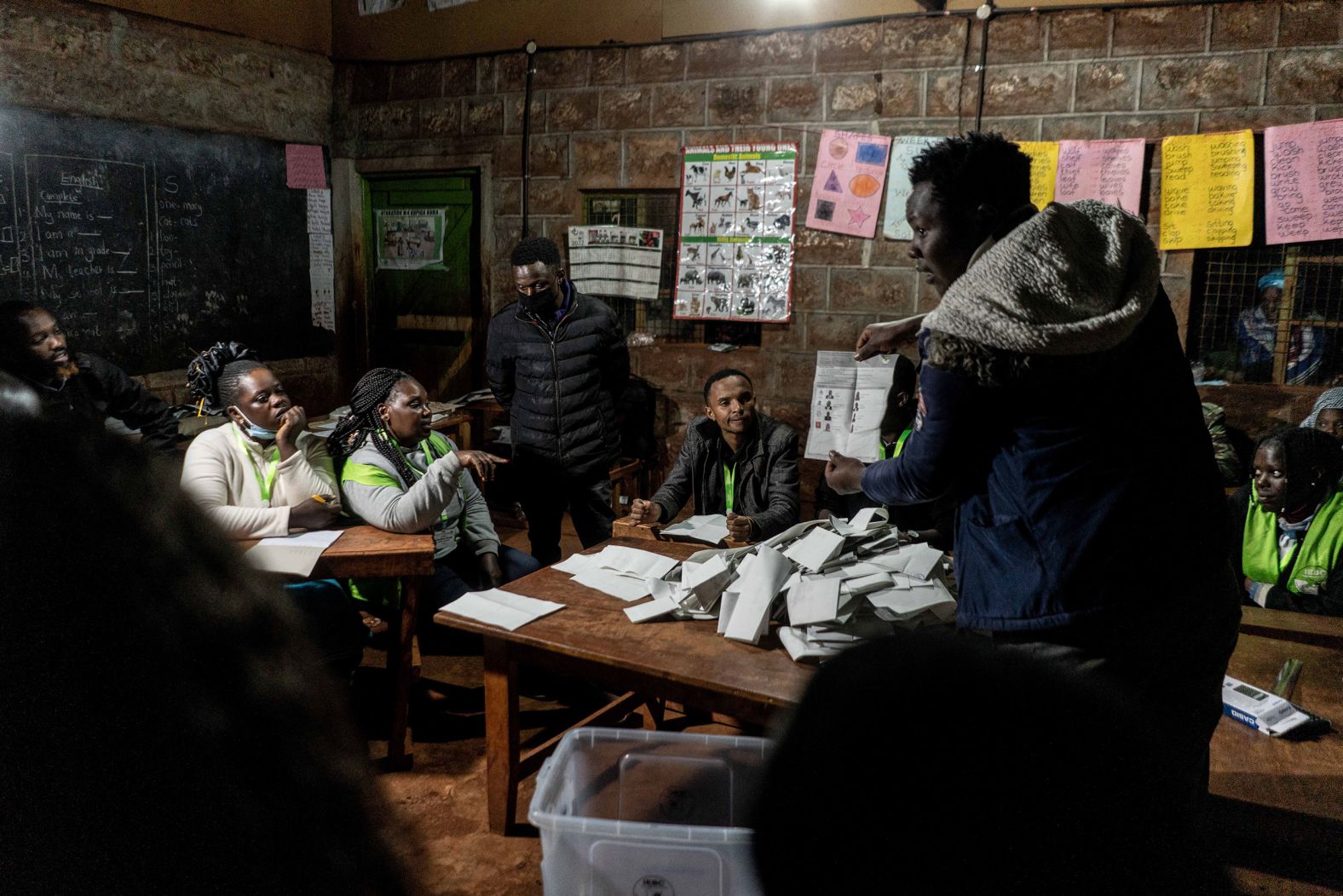 A member of the Independent Electoral and Boundaries Commission shows a presidential ballot to observers in Kenya's Kiambu County on Tuesday, August 9. The country's presidential race <a href="https://www.cnn.com/2022/08/09/africa/kenya-elections-polls-open-intl/index.html" target="_blank">was still too close to call on Thursday.</a>