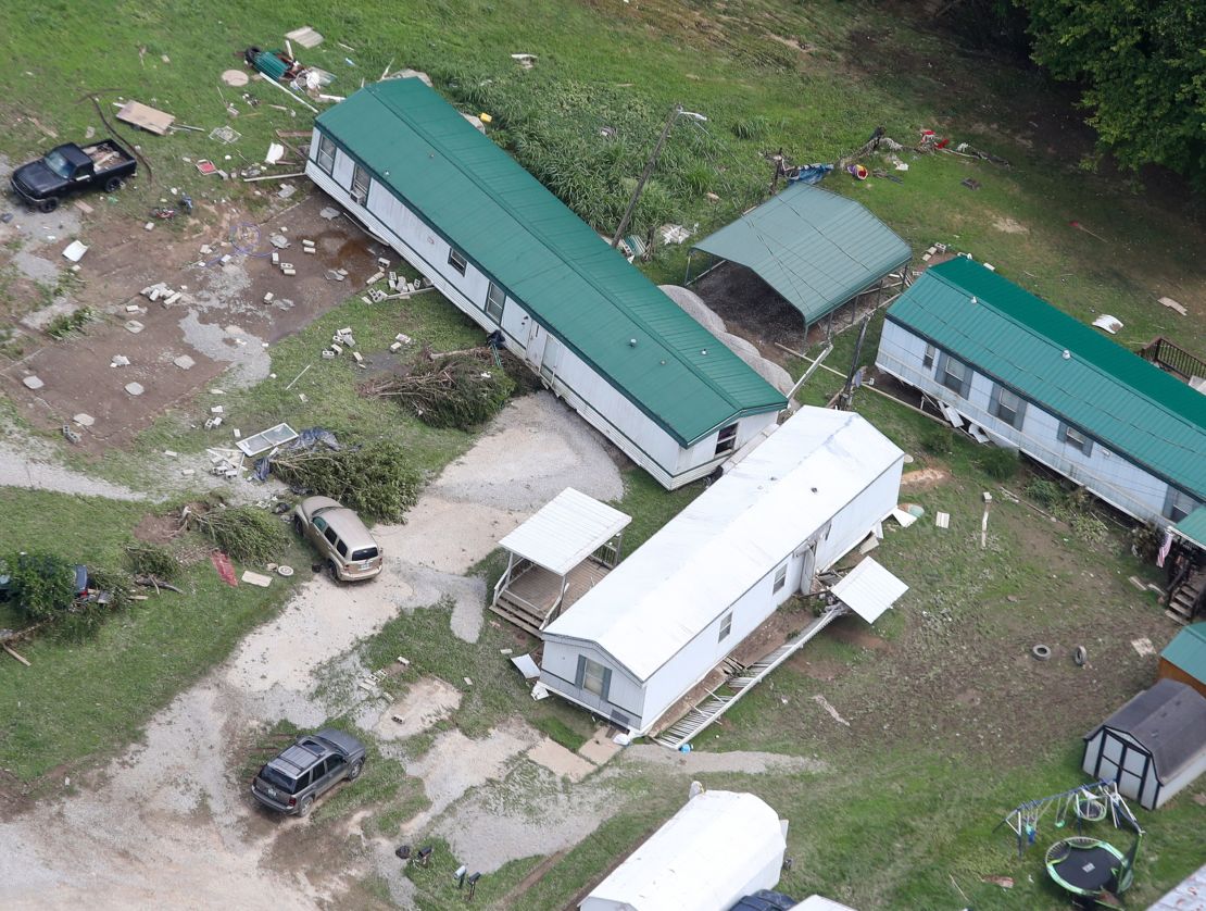 In this aerial photo, mobile homes are seen washed off their foundations on Saturday, July 30, 2022, after historic rains during the week flooded many areas of Kentucky. 