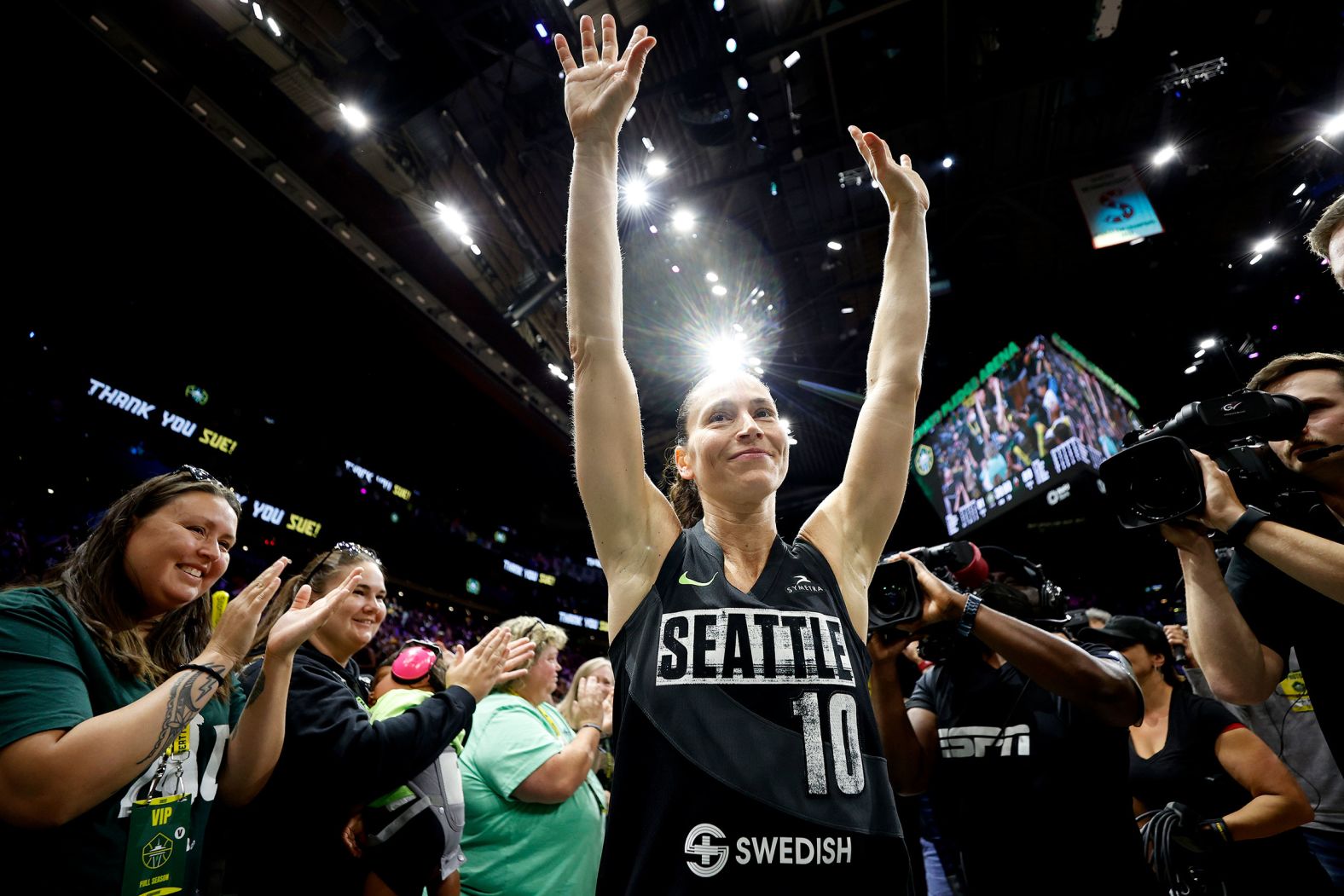 WNBA star Sue Bird waves to fans in Seattle after playing the last regular-season home game of her career on Sunday, August 7. Bird, one of the best women's basketball players in history, is retiring after this season.