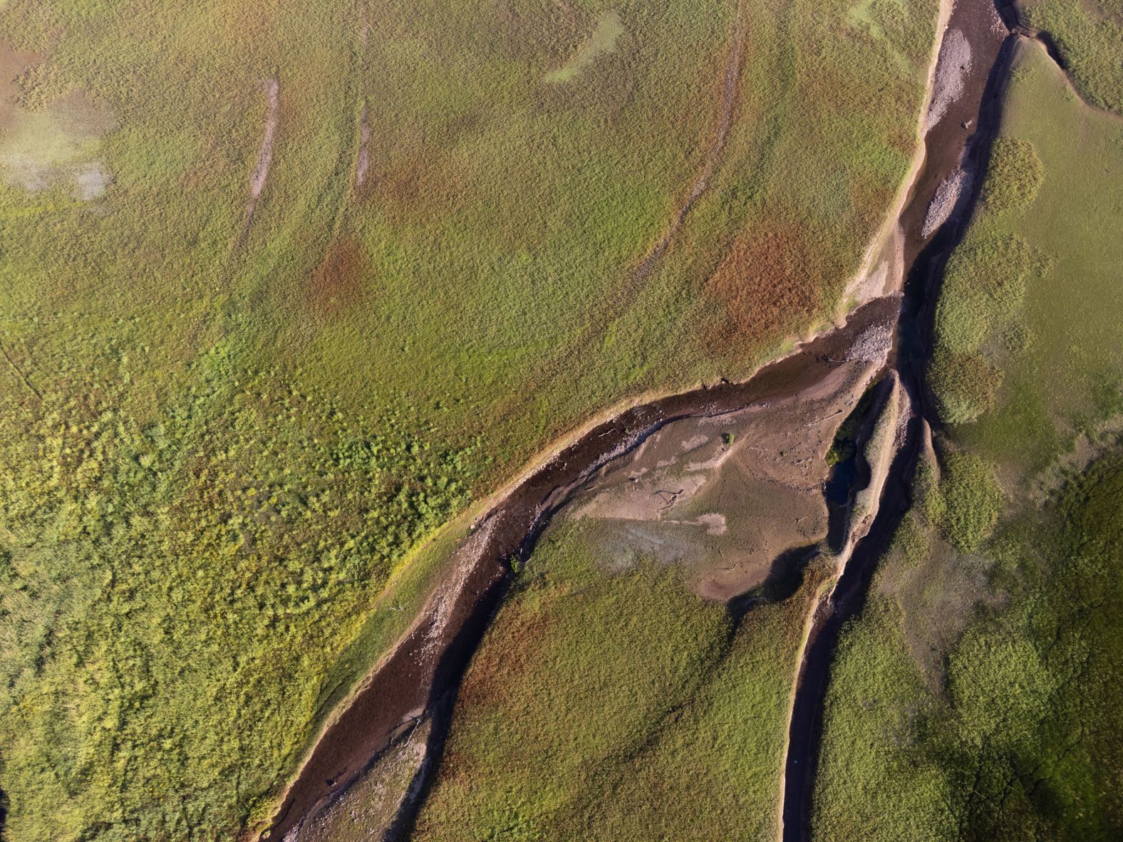 This aerial photo shows low water levels at reservoirs in South Wales on Saturday, August 6. Sixty-three percent of land in the European Union and United Kingdom is now under either <a href="https://www.cnn.com/2022/08/08/europe/eu-uk-drought-warnings-weather-climate-intl/index.html" target="_blank">drought warnings or alerts,</a> according to data published by the European Drought Observatory on August 3.