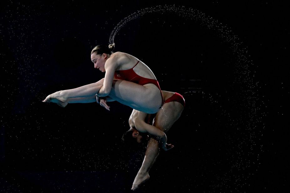 English divers Jordan Houlden and Yasmin Harper compete in a synchronized springboard event during the Commonwealth Games on Monday, August 8.
