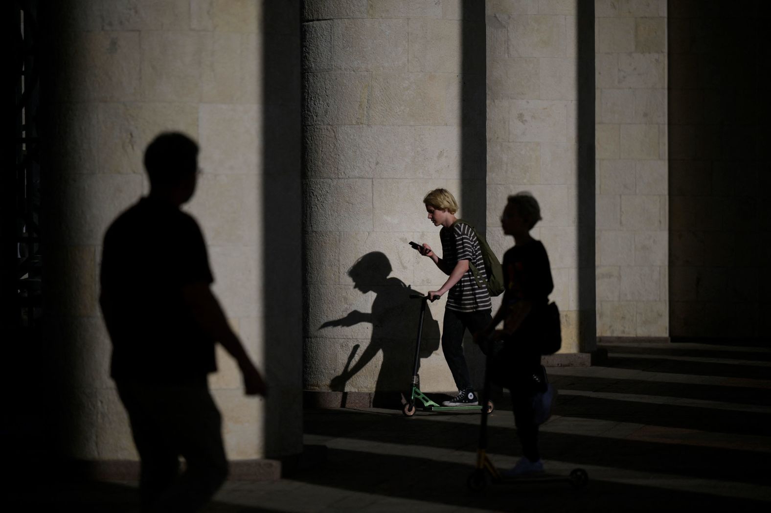 Children ride scooters along a street in Moscow on Wednesday, August 10. <a href="http://www.cnn.com/2022/08/04/world/gallery/photos-this-week-july-28-august-4/index.html" target="_blank">See last week in 38 photos.</a>