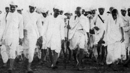 Library filer dated 06.04.30. Civil Disobedience in India. Mr. Gandhi (with staff in hand) and his volunteeers marching to the sea face at Dandi on the morning of April 6th, when they broke the Salt laws.  25.04.30.  Mahatma Gandhi became widely known as the man credited with securing India's independence.  He had led a campaign of non-violent resistance to British rule for decades.  But, on the day the sun finally set on the British Raj in India at the stroke of midnight on August 14 1947, and Gandhi's goal was realised, he could not rejoicing for long.  Jubilant scenes across the country quickly turned to horror.  Thousands died as battles erupted between Muslims and Hindus in the two new countries of India and Pakistan, created through the partition of the religiously-divided sub-continent.   AVAILABLE BLACK AND WHITE ONLY.No Use UK. No Use Ireland. No Use Belgium. No Use France. No Use Germany. No Use Japan. No Use China. No Use Norway. No Use Sweden. No Use Denmark. No Use Holland