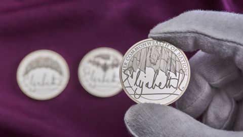 While the Queen's signature is one of the most recognizable in the world, it's never been struck on UK coinage until now. 