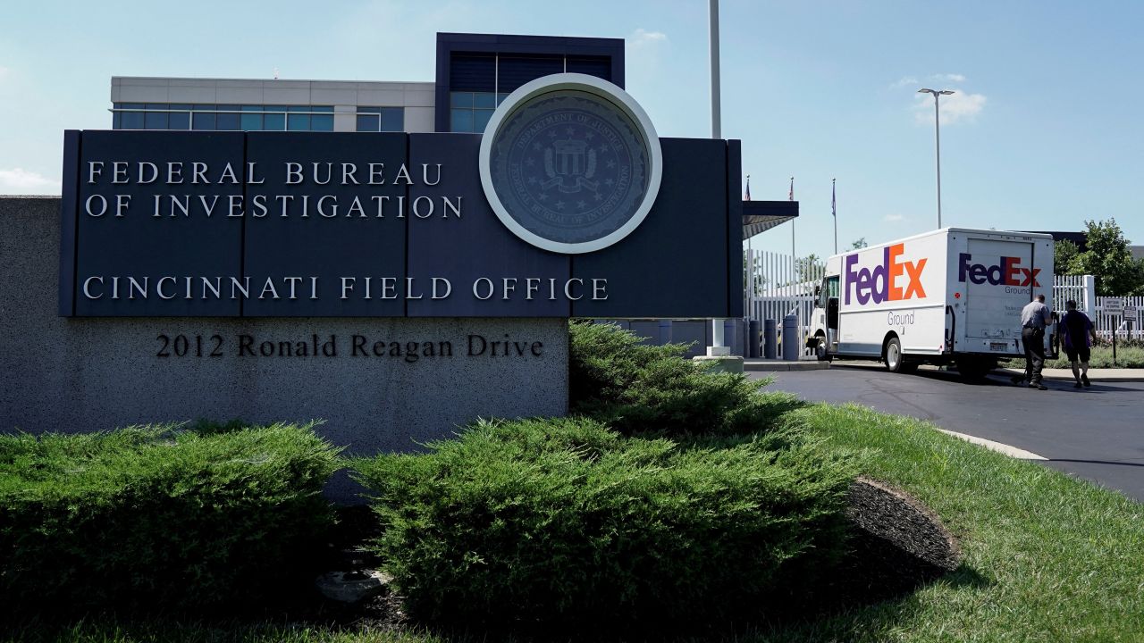 A FedEx truck is inspected outside of the front gate of the FBI's Cincinnati Field Office after reports of a suspect attempting to attack the FBI building in Cincinnati on August 11, 2022. 