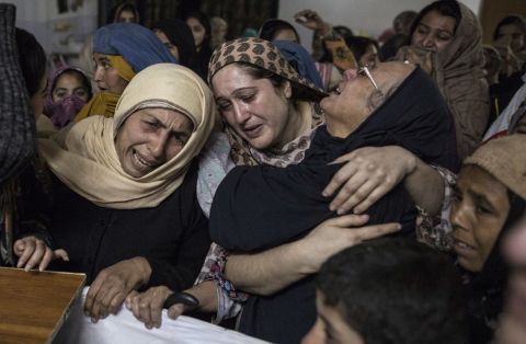 Women mourn their relative Mohammed Ali Khan, 15, a student who was killed during an attack by Taliban gunmen on the Army Public School, at his house in Peshawar on December 16, 2014. Taliban gunmen in Pakistan killed 145 children during an attack on a school in the northwestern city of Peshawar. 