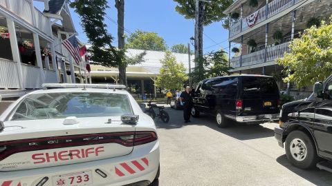 A police officer, center, carries out a bag from the amphitheater after author Salman Rushdie was attacked during a lecture Friday at the Chautauqua Institution in Chautauqua, New York.