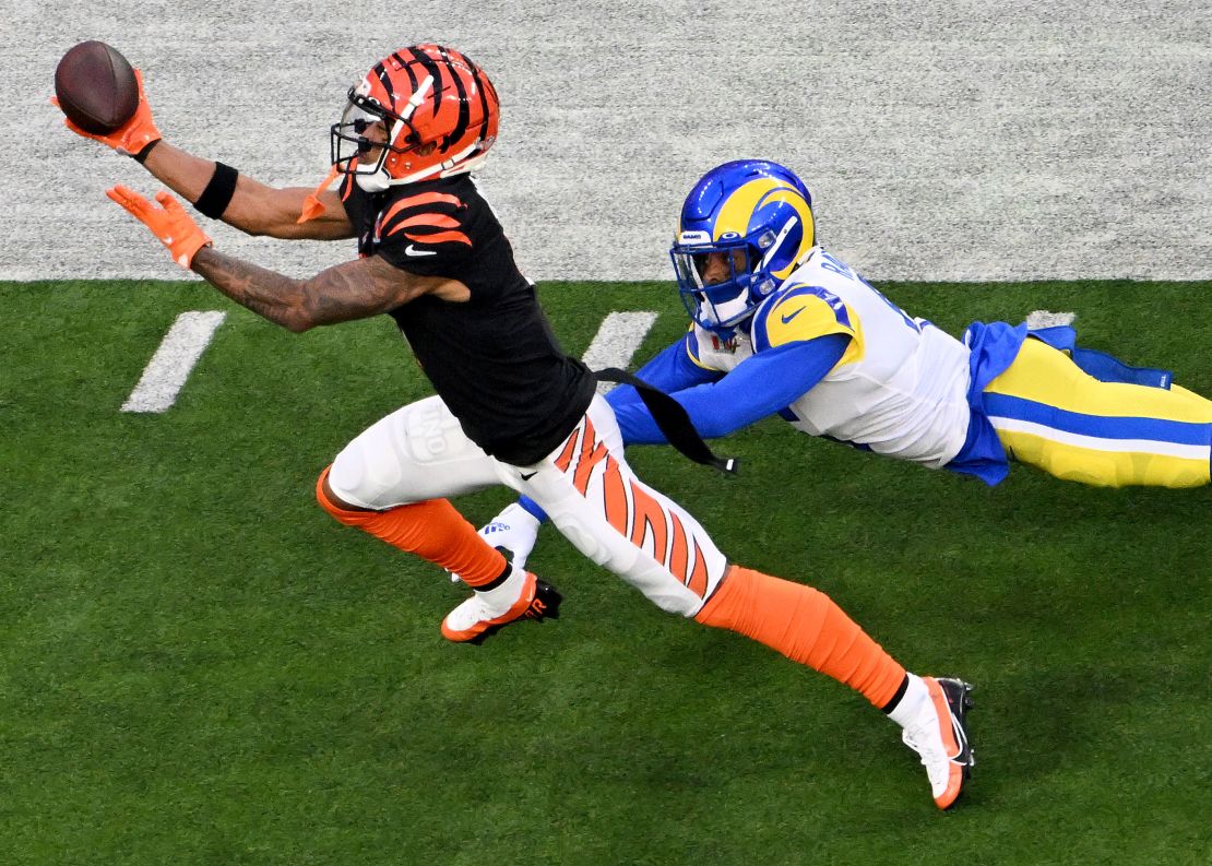 Chase makes a one-handed reception as Rams cornerback Jalen Ramsey defends during the first quarter of Super Bowl LVI.
