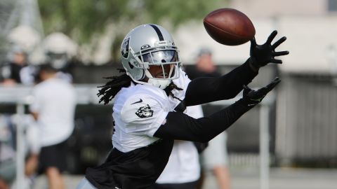 Adams catches a pass during the team's first full-padded practice session during training camp. 