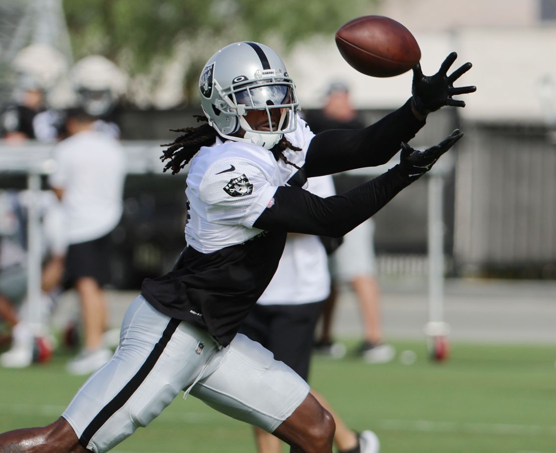 Adams catches a pass during the team's first fully padded practice during training camp. 