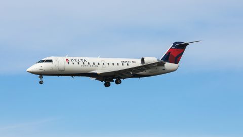 A Delta Air Lines plane flying into JFK. 