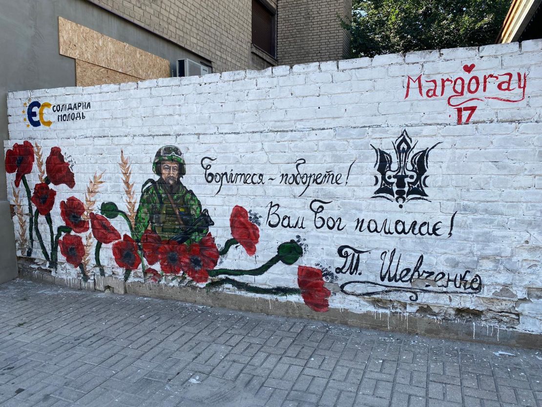 A mural supporting Ukrainian soldiers is seen on a wall in the village of Pokrovske.
