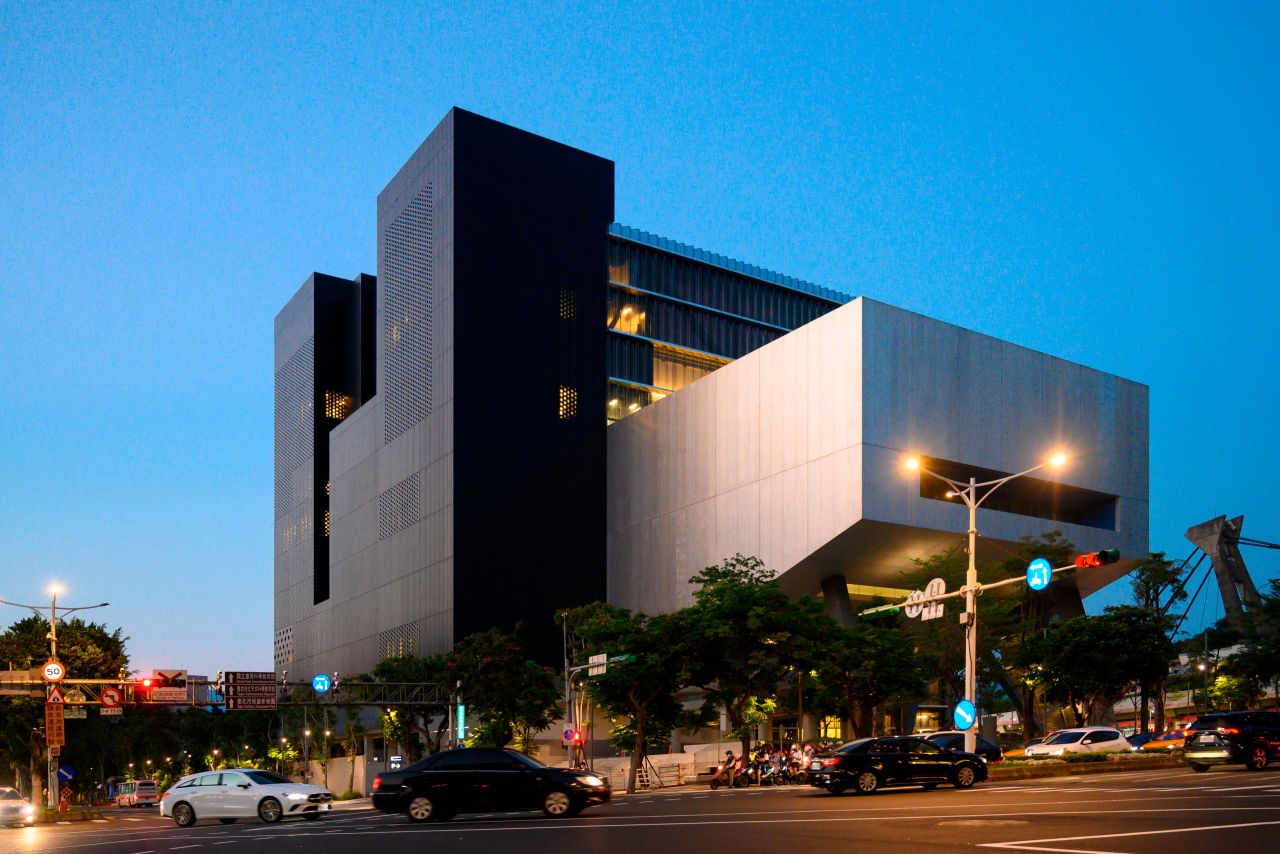 The theater spaces protrude from center or the building, which has non discernible front or back.