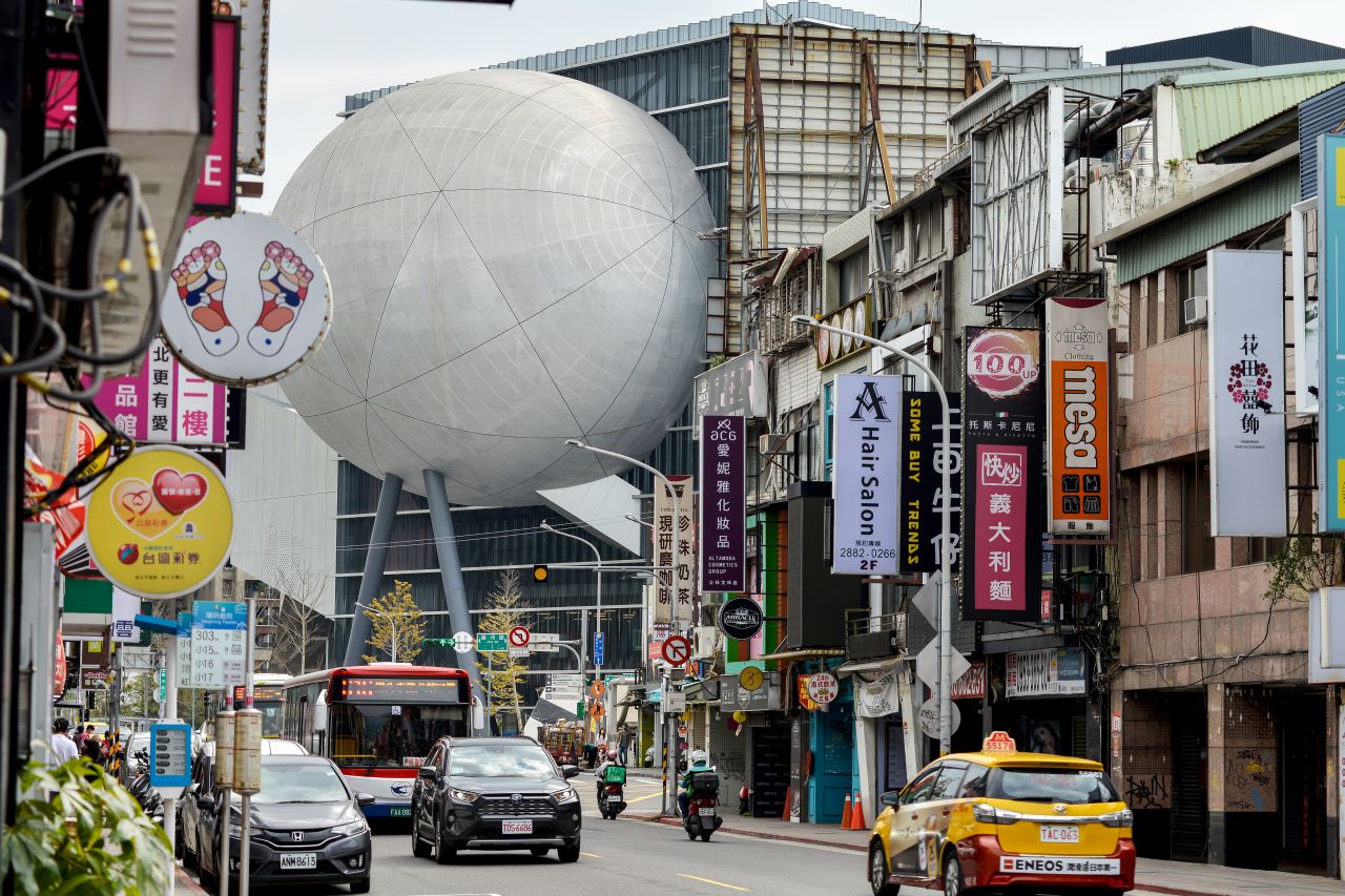 The theater, as seen from the busy streets of Shilin district, prior to its completion.