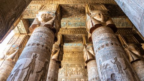 The interior of the Dendera Temple in Egypt is vivid on a sunny day.