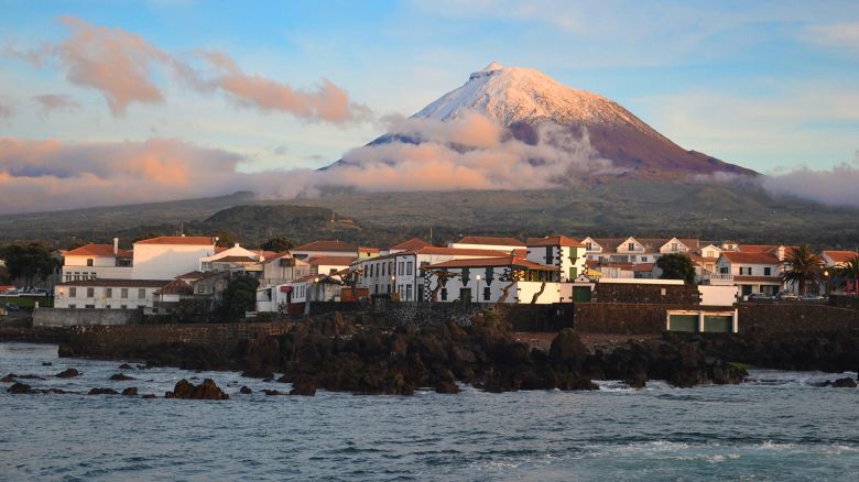 The highest mountain of Portugal, the Azores volcano Montanha do Pico on the island of Pico at sunset, village Madalena