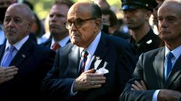 Former New York City Mayor Rudy Giuliani (C) attends the annual 9/11 Commemoration Ceremony at the National 9/11 Memorial and Museum on September 11, 2021 in New York City. - During the ceremony six moments of silence were held, marking when each of the World Trade Center towers was struck and fell and the times corresponding to the attack on the Pentagon and the crash of Flight 93. The nation is marking the 20th anniversary of the terror attacks of September 11, 2001, when the terrorist group al-Qaeda flew hijacked airplanes into the World Trade Center, Shanksville, PA and the Pentagon, killing nearly 3,000 people. (Photo by Chip Somodevilla / POOL / AFP) (Photo by CHIP SOMODEVILLA/POOL/AFP via Getty Images)