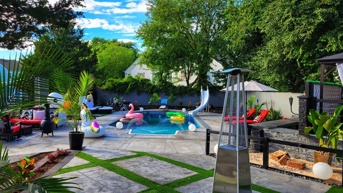 Fabiola Farrah Colas-Williams and Kyle Williams of Suffolk, New York rent out their pool on Swimply. Their backyard also includes a firepit, as well as basketball and vollyball courts.