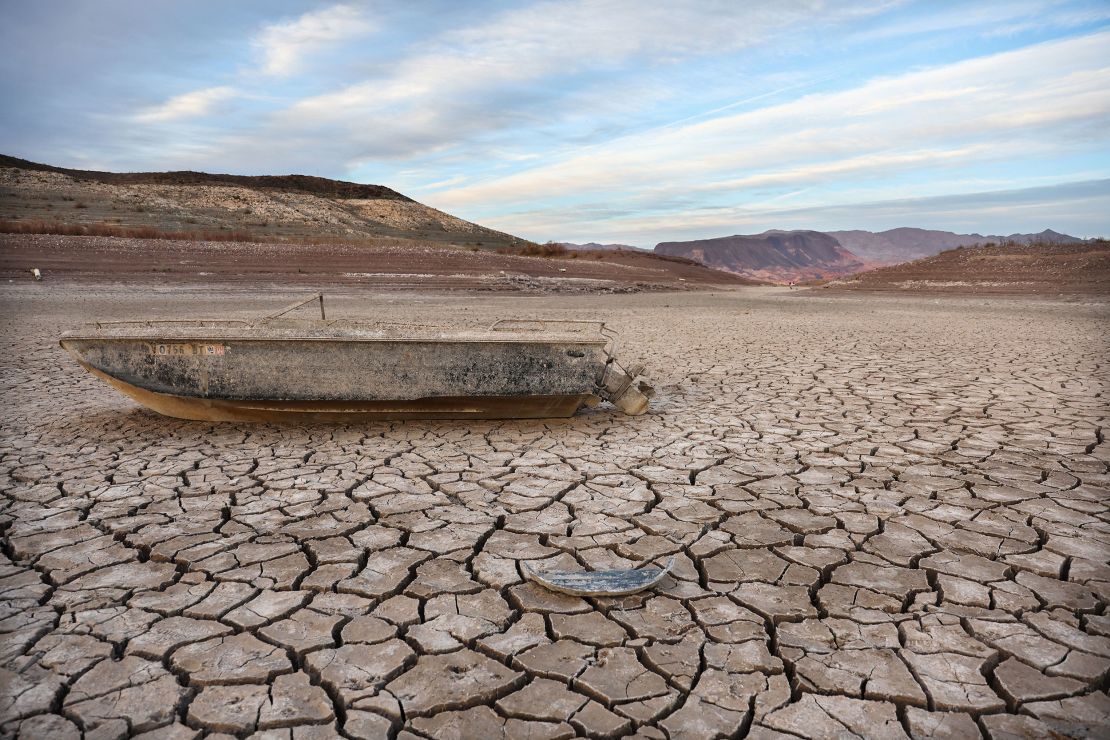 A formerly sunken boat rests on a now-dry section of lakebed of Lake Mead in May.
