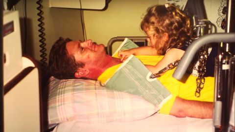 Schmidt's daughter visits him in the hospital after his accident.