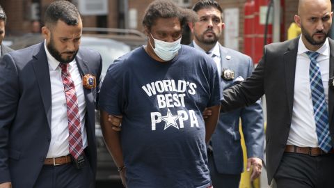 Trevon Murphy, 40, is walked from the 6th Precinct on July 13, 2022, in Manhattan.