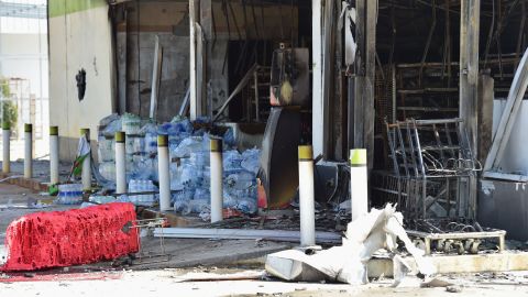 Convenience stores damaged after an attack in Cho-airong district in southern Thailand's Narathiwat province on August 17.